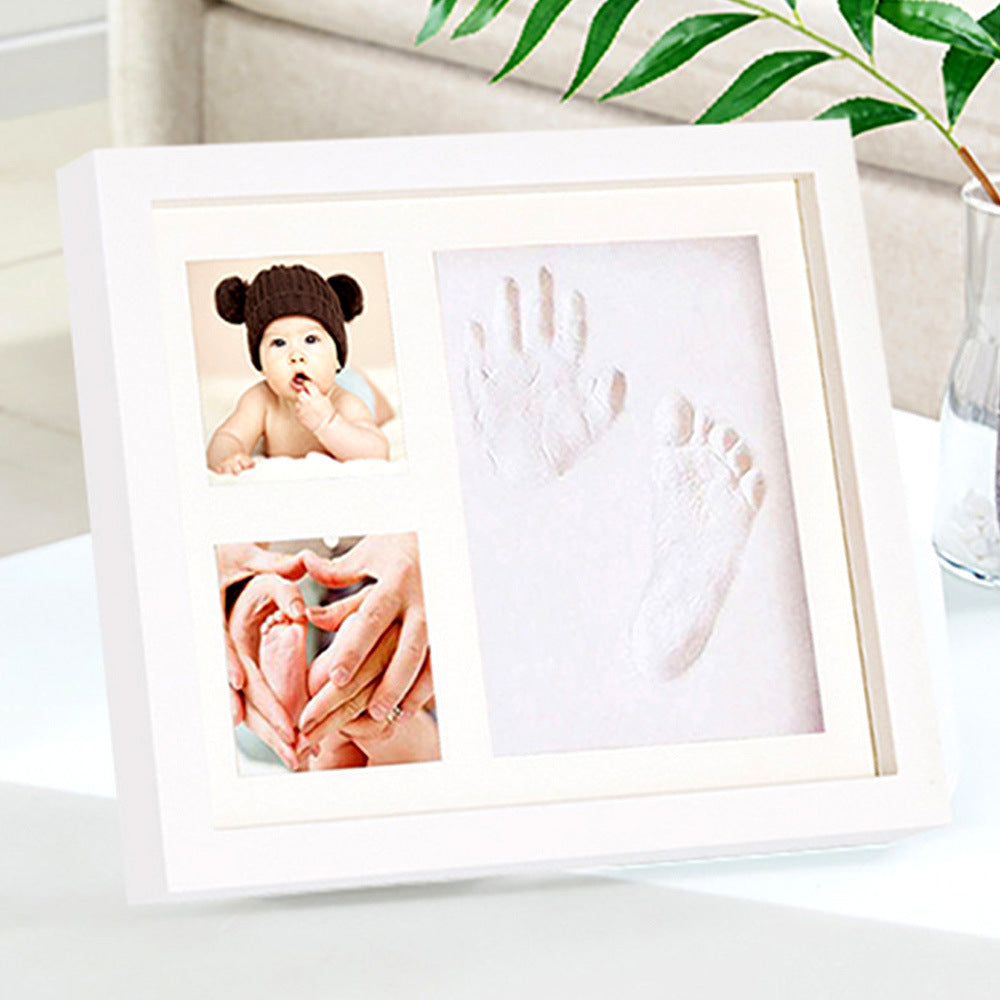 Hot sale baby hand and foot seal mud photo frame pet paw print hollow memorial frame wall hanging table baby DIY photo frame